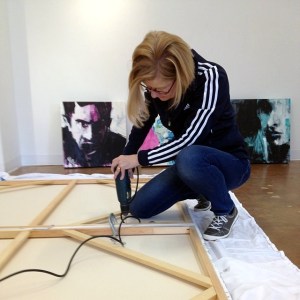 Leslie Nolan Preparing Artwork at Touchstone Gallery